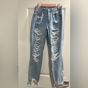 Destroyed raw hem mom jeans